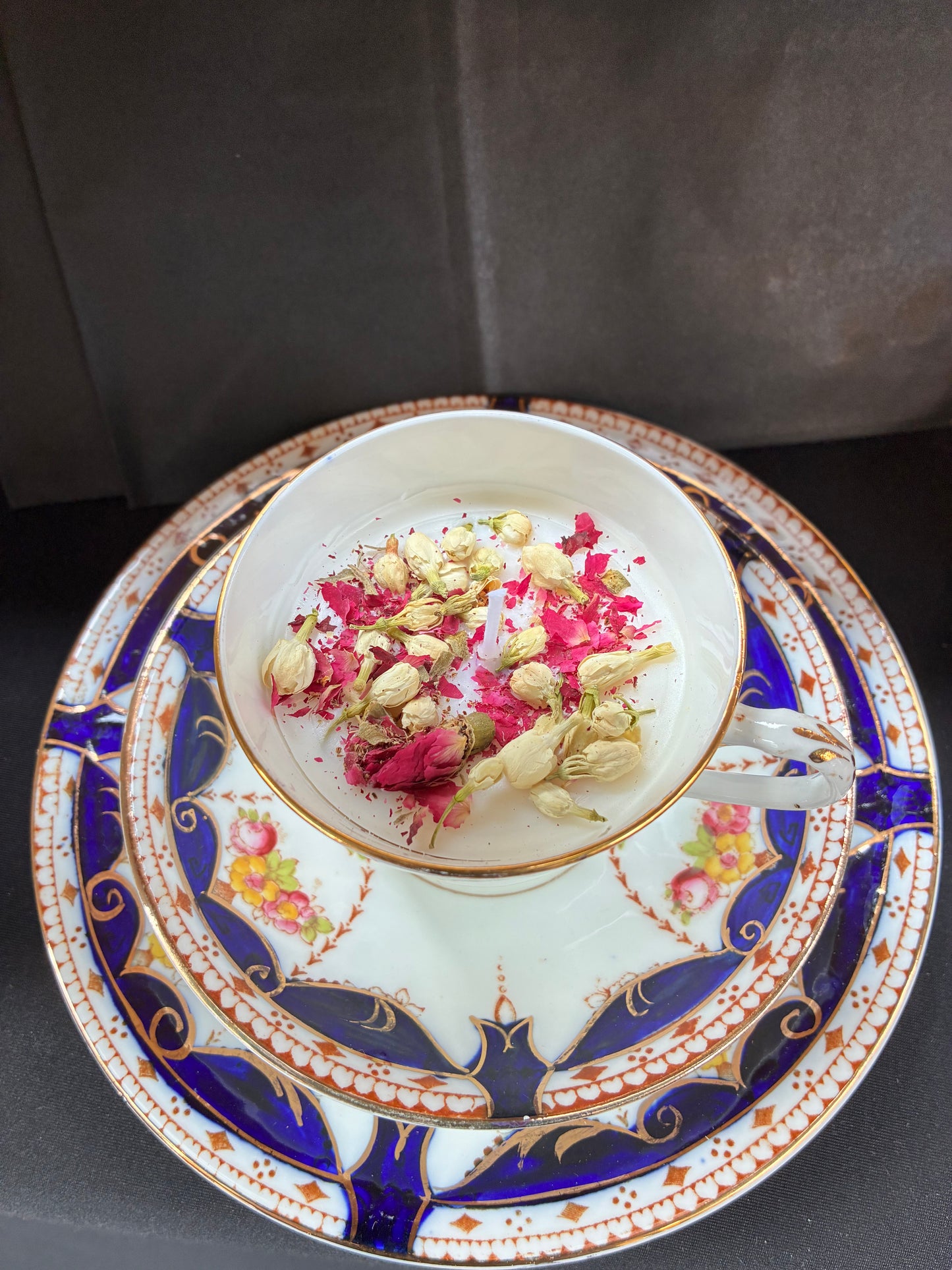 Handmade Vintage Teacup Set Candle scented with jasmine essential oils and topped with dried botanicals, tailored to The Timeless Glow tone.