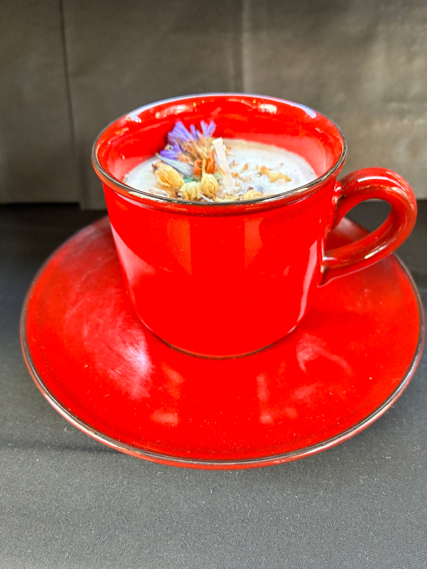 Handmade Vintage Teacup Candle scented with Red Velvet essential oils, topped with botanicals, tailored to The Timeless Glow tone.