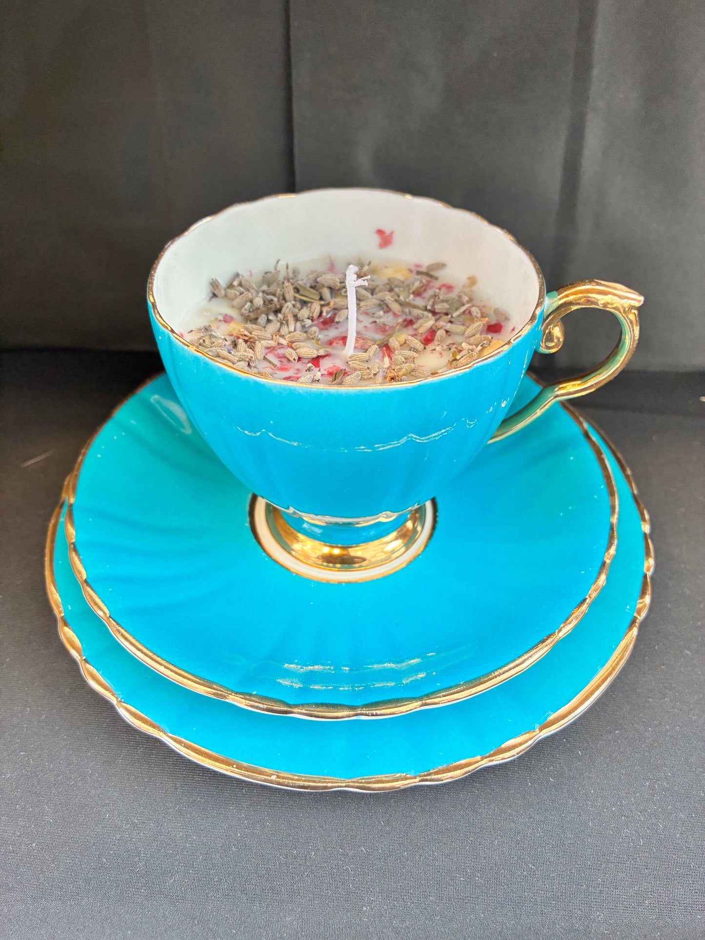 Hand poured Vintage Teacup Set Candle scented with blue rose essential oils, tailored to The Timeless Glow tone.