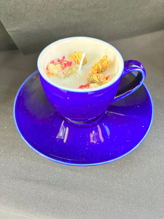 Hand poured Vintage Teacup Candle scented with blue rose essential oils topped with dried botanicals, tailored to The Timeless Glow tone.
