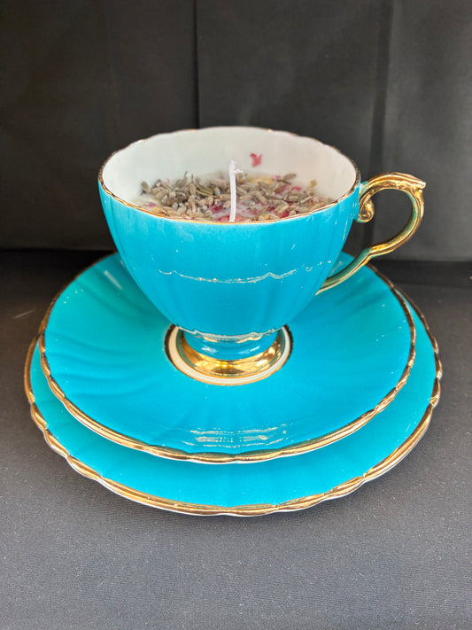 Hand poured Vintage Teacup Set Candle scented with blue rose essential oils, tailored to The Timeless Glow tone.