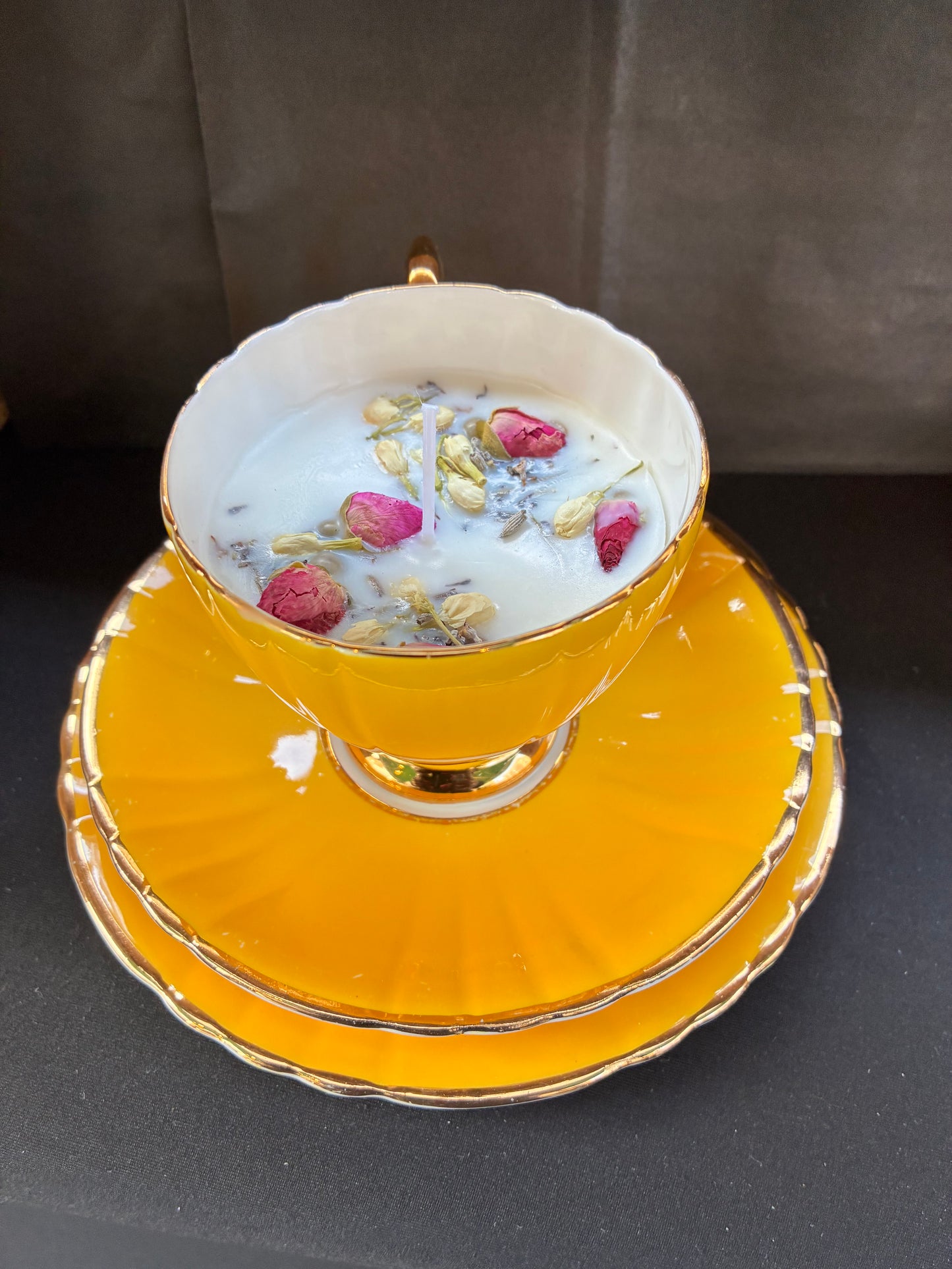 Hand poured Teacup Set Candle scented with yellow rose essential oils topped with dried botanicals, tailored to The Timeless Glow tone.