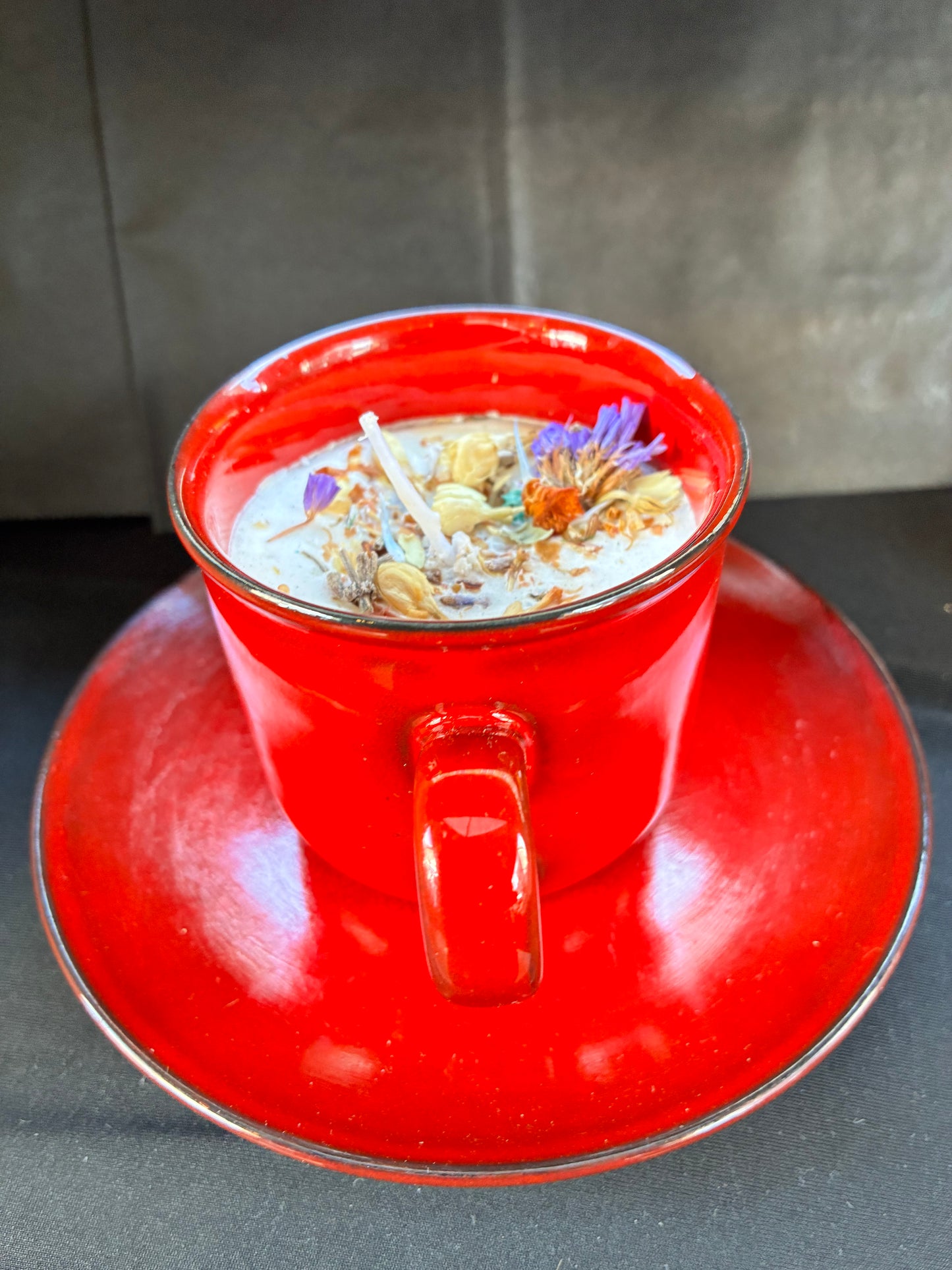 Handmade Vintage Teacup Candle scented with Red Velvet essential oils, topped with ￼botanicals, tailored to The Timeless Glow tone.
