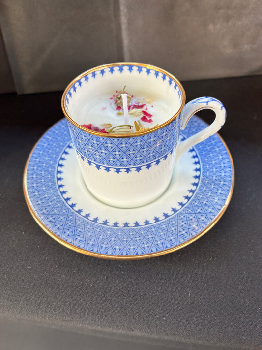 Handmade Vintage Teacup Candle scented with blue rose essential oils topped with dried botanicals, tailored to The Timeless Glow tone.